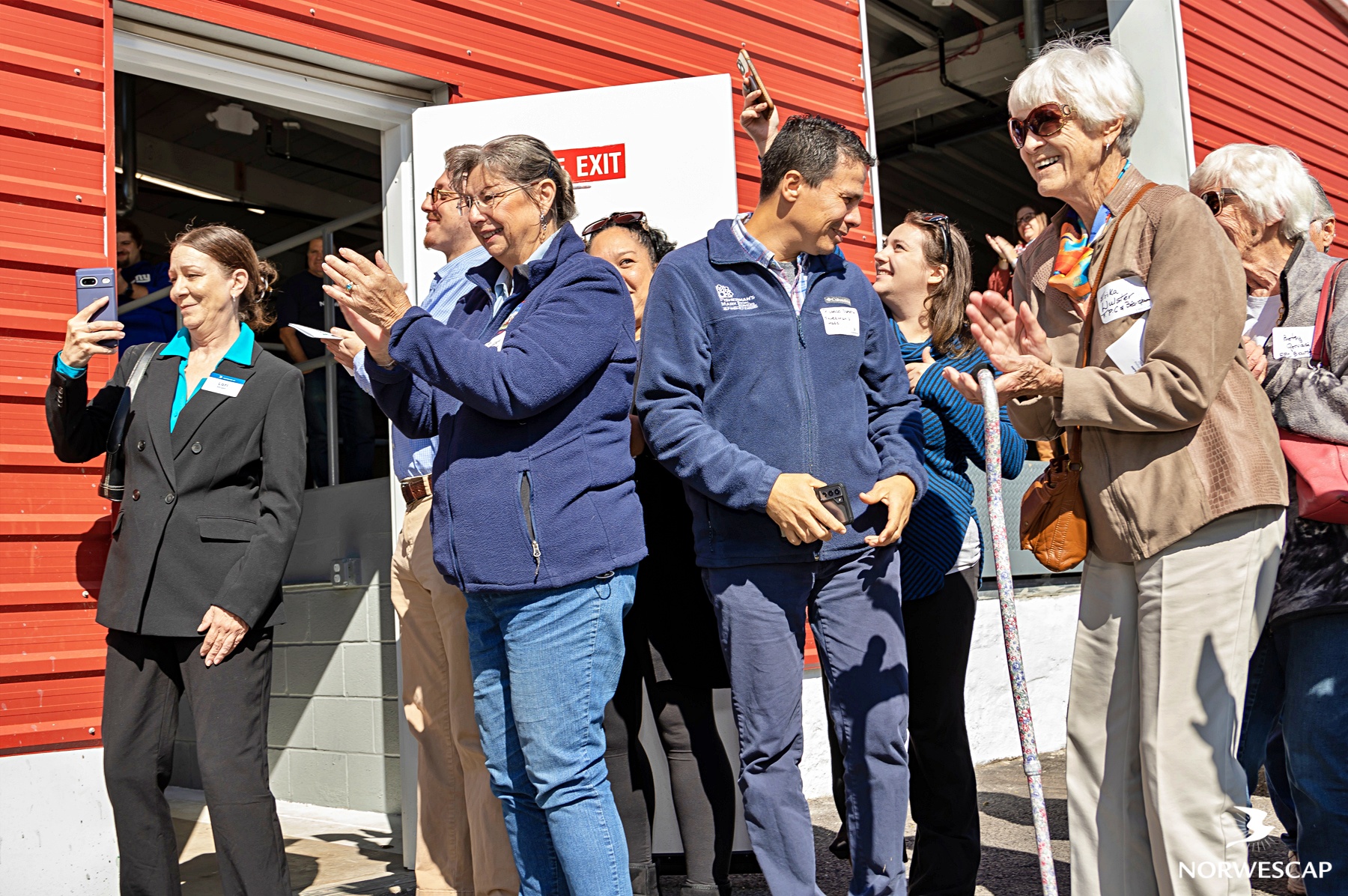 The culmination of the ceremony was the cutting of the bright blue ribbon that adorned the entrance to the Annex. Dignitaries lined up, and as Mark Valli cut the ribbon, there was an outpouring of cheers and applause, symbolizing a significant step towards boosting food security in our region. 